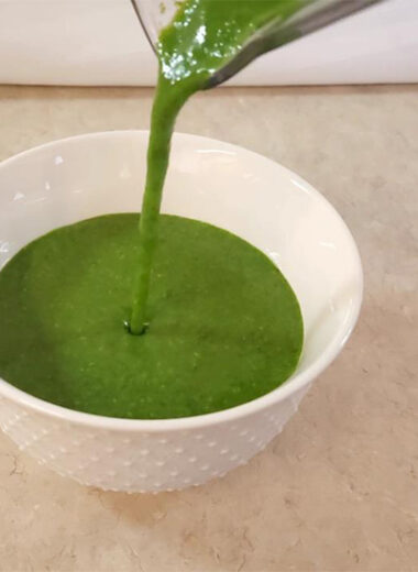 This is a photo of my pouring my Spinach Pesto into a bowl after blending it.